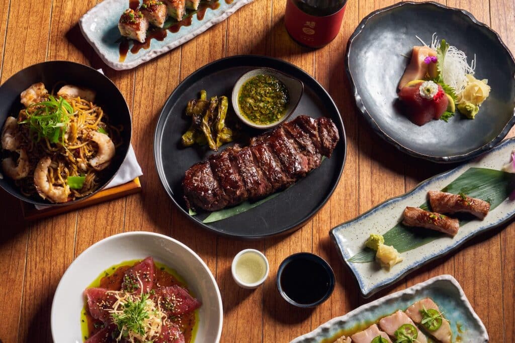 S3 dinner spread with steak, sushi, and seafood